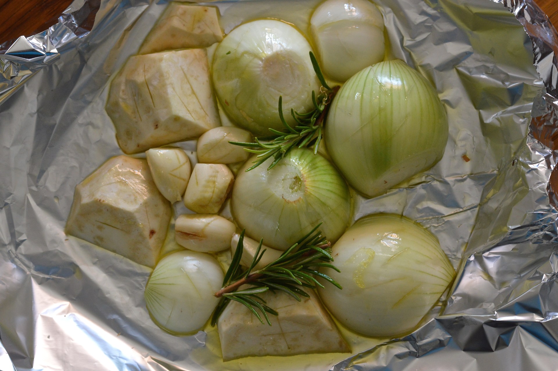 Roasting onions, celeriac and garlic